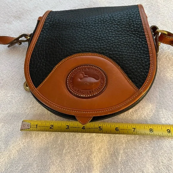 Dooney & Bourke All Weather Leather Black & Tan Saddle Crossbody Bag. - Picture 7 of 9